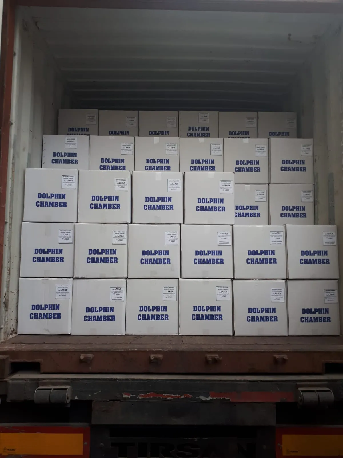ALPHA products loaded into a container